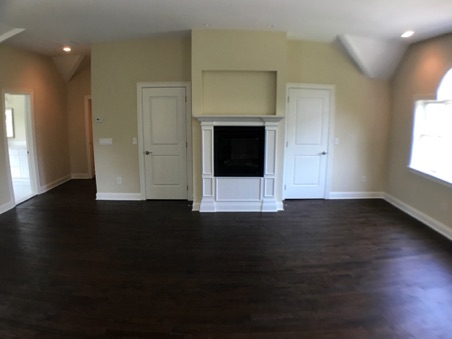 The Master Bedroom features a gas fireplace and 2 Walk-In Closets The Master Bedroom features a gas fireplace and 2 Walk-In Closets